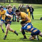 Samu Babiau carries the ball for North Otago during their preseason game against Otago Country....