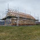Questions are being raised over whether this building is over-height. PHOTO: SCOOP