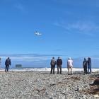 A rescue helicopter searched Rapahoe Beach on Wednesday. Photo: Greymouth Star 