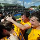 Otago players celebrate clinching bronze at the national hockey championships in Palmerston North...