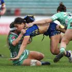Charlotte Va'afusuaga of Otago is tackled during tonight's Farah Palmer Cup championship final...