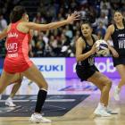Silver Ferns wing attack Kimiora Poi looks for her options under the pressure of Roses wing...