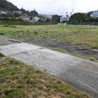 Work has ground to a halt on this Albertson Ave, Port Chalmers site where new Kāinga Ora homes...