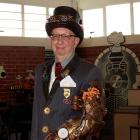 Dunedin Steampunk Society treasurer Allan Benfell shows a robotic arm he created from recycled...