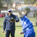 Otago coach Ashley Noffke puts Luke Georgeson through his paces during a training session in...