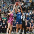 Ahlise Hurst puts up a three under the pressure of Whai player Kaylee Smiler at the Edgar Centre...
