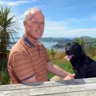 Otago regional councillor Bryan Scott, pictured with his dog Awa, is quitting the council in...