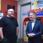  Labour leader Chris Hipkins shares a laugh with Wests co-director Craig McFarlane as part of his...