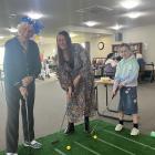 Bupa Windsor care home resident Heather Shields playing a game with her daughter Amy-Rae...