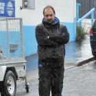 Auto Repair Otago mechanic Aaron Carmichael stares in dismay at an overflowing drain. 