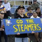 A young Bay of Plenty fan cheers for the Steamers during an NPC game in Tauranga. PHOTO: GETTY...