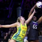 Grace Nweke of New Zealand and Courtney Bruce of Australia compete for the ball during game one...