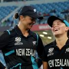 White Fern Suzie Bates shares a laugh with team-mate Eden Carson after defeating South Africa in...