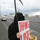 The Grim Reaper took to the streets by the new Dunedin hospital site yesterday to protest...