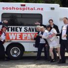 Dunedin city councillors are unusually united as they launch the ambulance "Cliff" on its journey...