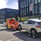 This Mazda was towed out of the active bus lane on Lincoln Rd on Monday. Photo: Dylan Smits