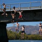 Jumping off the Albert Town Bridge in 2019 were teenagers Hadley Tamati, Micah Cousins, Tana...
