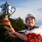 Takahiro Hataji celebrates with the Brodie Breeze trophy at the New Zealand Open earlier this...