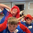Dressed up and ready to have fun are Groove Getters Lachlan (front), Kieana (left) and Ollie....