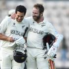 Ross Taylor and Kane Williamson embrace after Taylor hit the winning runs. Photo: Getty Images