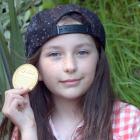 George Street Normal School pupil Ash Boraman-Ritchie earned a medal for coming first in New...