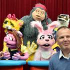 Surrounded by puppets at NHNZ’s Dunedin studio in 2016 are (above) ZooMoo creative director  Ian...