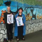 Keep Dunedin Beautiful chairwoman Cr Mandy Mayhem (right) and artist Bruce Mahalski hold a couple...
