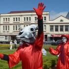 Protesters took to the streets of Dunedin yesterday to remind the city about the threat of...