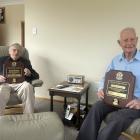 Neil McPhail (left) and John Falconer with their Melvin Jones Fellowship plaques, awarded to them...