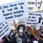 Protesters make their thoughts known on the plans to downgrade the new hospital. PHOTO: STEPHEN...