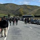 Cars and people converge on the road from Gore to Raes Junction, heading to Alexandra for the...