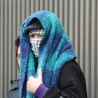 Jack Brazil appears covered up in court in Dublin. Photo: Paddy Cummins