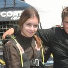 Sibling ministock racers Leilah, 16, and Bailey, 12, Jeffcoate lean on each other after racing at...
