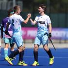 Alpiners players George Baker (left) and Patrick Ward celebrate during a Premier Hockey League...
