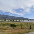 This line of caravans, being used as worker accommodation at Mount Pisa, were blown over by...