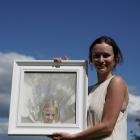 Ruby Burke with her painting, So Loved, which was the runner-up at the Wanaka Arts Council's...