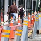 A total of 34 bollards are being installed outside the front of Woolworths Dunedin Central to...