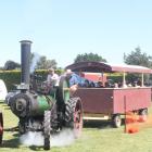 Tim Shanks (left) and Aaron Clarke were taking attendees of the Crank Up on steam engine rides,...