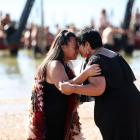 Kuia wait for waka on the beach at Waitangi last year during the annual celebrations. Photo:...
