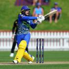 Otago's Dale Phillips gets a shot away against Wellington at the Basin Reserve. Photo: Getty