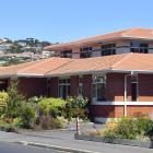 Signs at the Marne Street Hospital in Dunedin have discouraged unwell visitors, and visitors who...