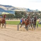 Commander Ben (centre) wins the Roxburgh Cup on Saturday for driver Kimberly Butt. PHOTO: MONICA...