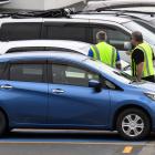 Dunedin City Council parking officers check cars parked in mobility carparks in St Clair. PHOTO:...