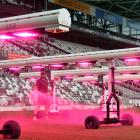 Forsyth Barr Stadium turf manager Michael Watson waters the pitch under new LED lights that will...
