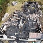 Police and Fire and Emergency New Zealand are investigating the cause of a fire that burned down...