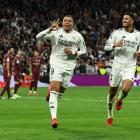 Real Madrid’s Kylian Mbappe (left) and Jude Bellingham celebrate Mbappe’s third goal against...
