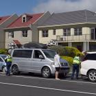Police and ambulance officers attend a 3-car nose-to-tail accident at the intersection of Anzac...