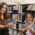 Balclutha Library customer experience officer Renee MacPherson (left) and student librarian Wendy...