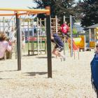 Bushyhill playground upgrade committee spokeswoman Gloria McHutchon enjoys the completed first...