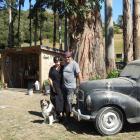 Julie Moroney and Oggie Hight stand beside an Austin A40 pick-up at their Kaitangata property....